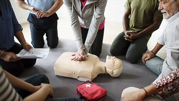 woman-performing-cpr-training
